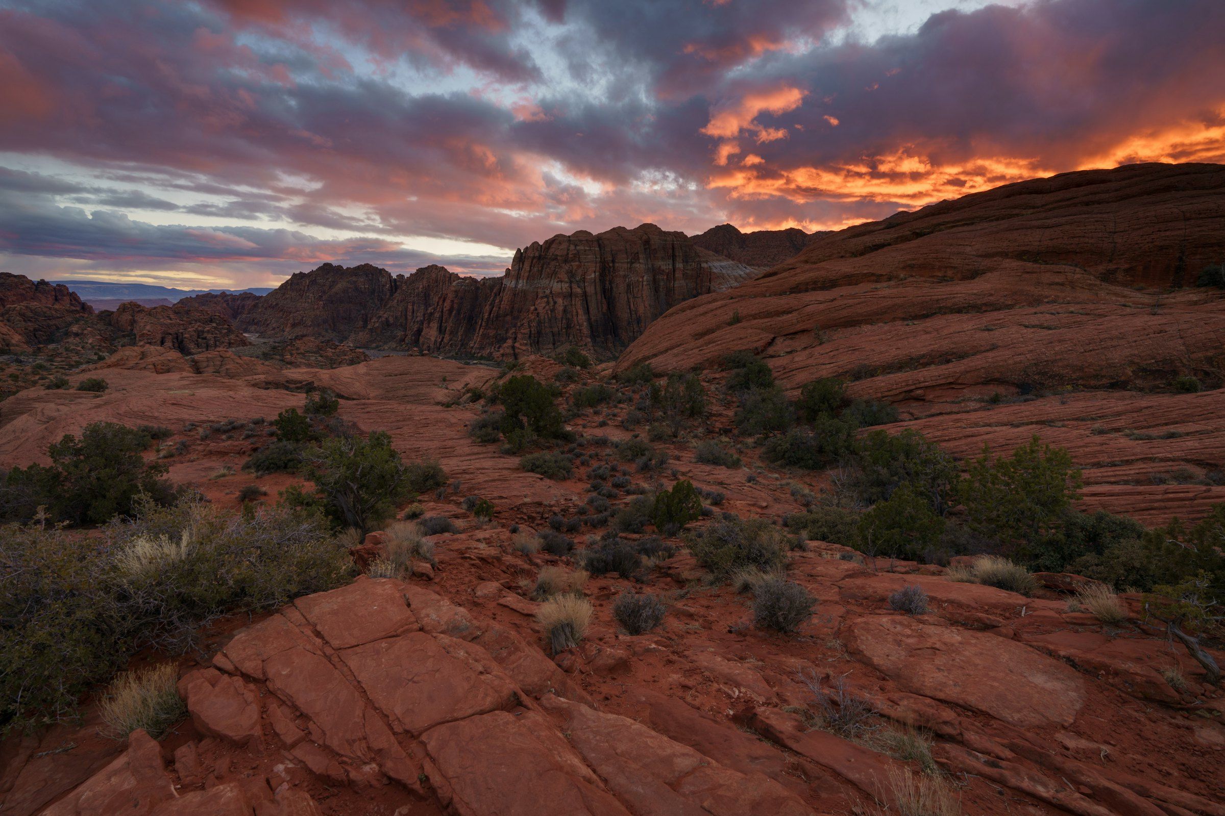 Snow Canyon sandstone at dusk under a warm sky